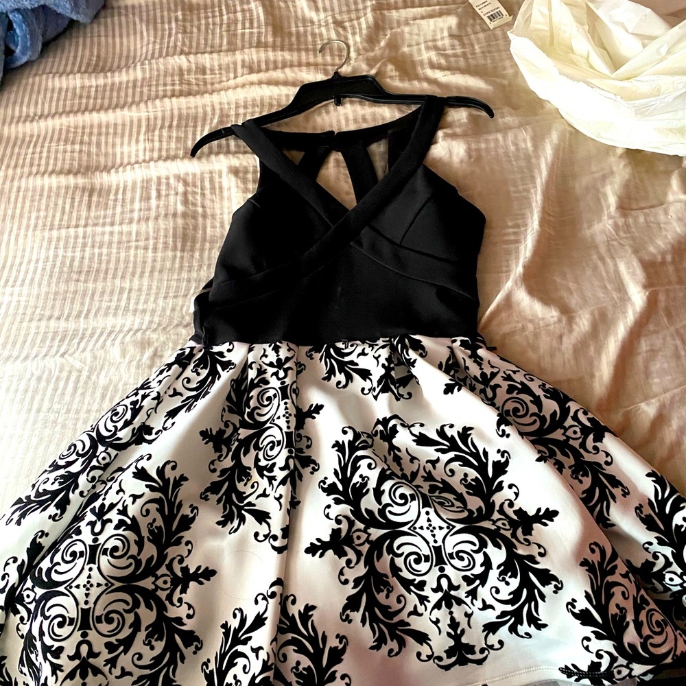 I’m selling a social core black and white dress I bought at the mall in macys.